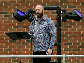 Opera singer Robert Clark performed to a sold-out crowd at the Edmonton Opera's Drive-In Opera on Saturday September 19, 2020. The performance was held on the rooftop of the Northern Alberta Jubilee Auditorium by three members of the Edmonton Opera with the audience parked in their vehicles at the rear parking lot.