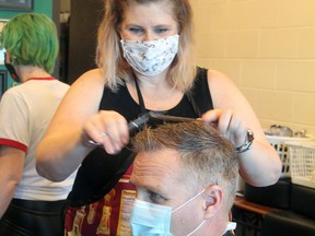 The owner of Triple B Barbershop in Millet, Pamela Allison, was as happy as her clients to be back cutting hair after the Provincial Government said last week that personal wellness services, like salons, barbershops and estethics could reopen Monday.