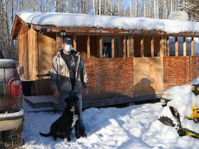 Keith Tremblay and his dog, Razor, outside his Conklin home on Saturday, January 23, 2021. Sarah Williscraft/Fort McMurray Today/Postmedia Network