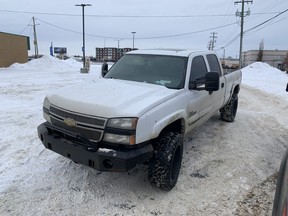 A recovered stolen white Chevrolet Silverado pickup truck  found by local RCMP.