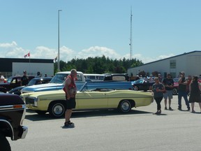 Saugeen Shores car lover Dave Middleton - shown with his 1969 Pontiac Parisienne prior to the start of a wildly successful car rally June 28 that drew approximately 600 cars – is inviting people to join the new Saugeen Shores Car Club.
