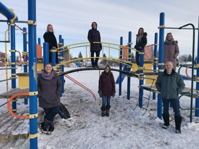The Spitzee Playground Committee at the old Spitzee Playground on Feb. 3. The committee is working on a project to bring a new playground for their kids and the community. Top left to right - Tiegan Jamison, Ila Nagus, Kristin Ellis, Sharalynn Abild. Bottom left to right - Alison Brown, Tricia Swallow, Bill Holmes. Missing: Michelle Smith, Melissa Duthie, Thaea Lockwood, Kelly Hartmann.