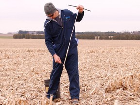 Upper Thames River Conservation Authority agricultural soil and water quality technician Michael Funk works on a cover-crop research project in the upper Medway Creek watershed, north of London. Area residents can now learn more about conservation projects like this one through the conservation authority's new weekly blog. (Submitted photo)