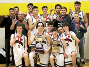PETER RUICCI/Sault Star
Head coach Hue Higham (second row, far left) and his 2020 White Pines Wolverines celebrate their senior boys high school basketball championship