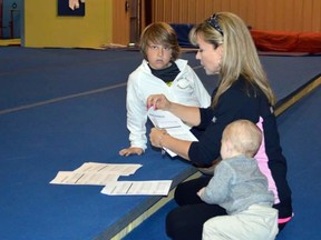 Anne Marie Couture with her two children at Jungle Gym Gymnastics.