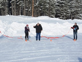 CMCA President Kevin Finn (from left to right), Division Three Coun. Bev Everts, Reeve Brian Hammond, and Foothills MP John Barlow cut a ribbon officially commemorating the completion of the Castle Area Regional Water Project on February 11.