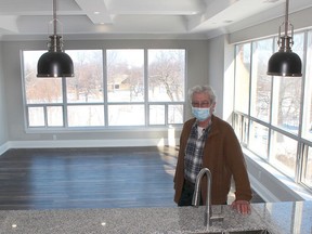 It's taken several years, but the Boardwalk apartment building in downtown Chatham is ready to start leasing luxury apartments. Developer Victor Boutin is seen here in a fourth-floor unit the overlooks Tecumseh Park. Ellwood Shreve/Postmedia Network