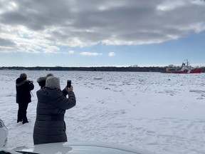 CCGS Samuel Risley breaks ice in the St. Clair River near Port Lambton on Feb. 9. Icebreakers from Canada and the U.S. were working for days to free an "ice plug" in the river that has caused flooding in the area. The work of the icebreakers has attracted an audience of photographers and others from the community. Peter Epp/Postmedia Network