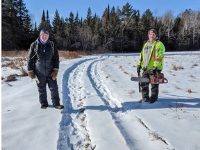 Volunteers Ted Priddle (left) and Thessalon Mayor Bill Rosenberg help spruce up the town’s cross-country ski trails. Demand for trail use has increased as residents are raring to get outside and be active as pandemic restrictions have put a damper on so many other social activities.