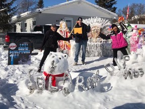 Winning the snow/ice sculpture contest in the 2021 Unofficial Cochrane Winter Carnival were the Sackaney Family
