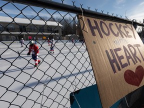 Players in the seventh staging of the World’s Longest Hockey Game were able to loosen up a bit last Sunday as the temperatures improved. 
Ian Kucerak/Postmedia Network