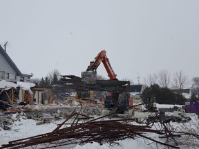 Demolition is underway at the former Dover Hotel, located at the corner of Winter Line Road and Pain Court Line. Crews are shown on Thursday at the property, which was in a poor state of repair in recent years. (Trevor Terfloth/The Daily News)