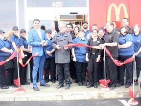Raj Bains with then mayor Rick Lang at the opening of the Melfort McDonalds in October 2019. File photo.