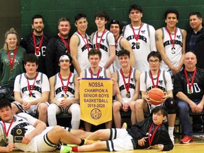 PETER RUICCI 
Head coach Hue Higham (first row, far right) and members of the White Pines Wolverines celebrate the 2020 NOSSA A senior boys basketball championship. The Sault's city champions stopped College Notre-Dame of Sudbury in the title game.