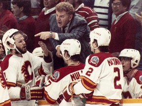 May 23, 1989 COACH Terry Crisp lays it on the line for Jamie Macoun, Colin Patterson, Joey Mullen, Al MacInnis, Hakan Loob in the third period. Photo by Mike Fiala, Calgary Herald. CALGARY HERALD FILE PHOTO *CALGARY HERALD MERLIN ARCHIVE* *DATE PUBLISHED SATURDAY, OCTOBER 29, 2005*