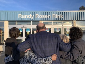 (Centre) Beloved local coach Randy Rosen was joined with his two sons Isaac and Raoul, wife Shalee and mother Gaby to celebrate the naming of the Sherwood Park Arena's ice surface to the Randy Rosen Rink on Friday, Feb. 19. Lindsay Morey/News