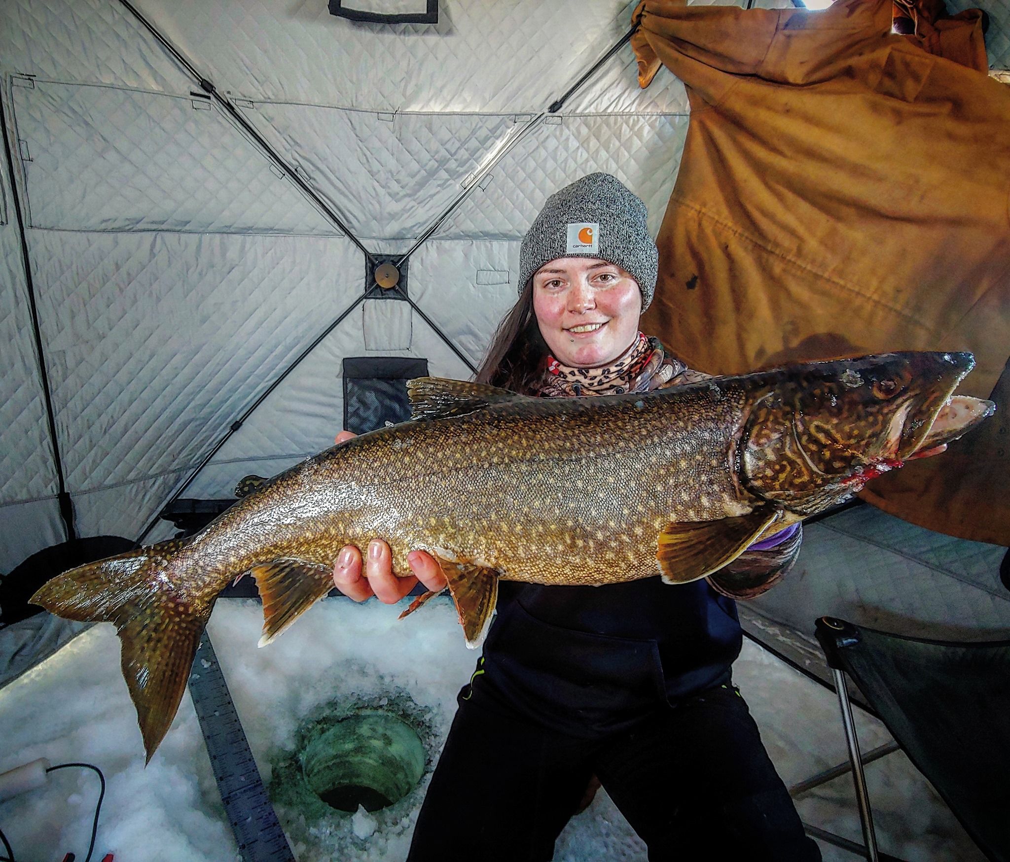 Ice fishing for lakers worth facing frigid temperatures and broken