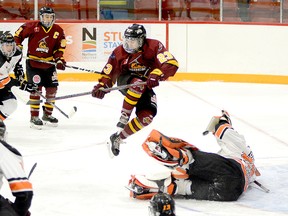 The Timmins Rock have traded forward Cameron Kosurko, shown here leaping to get out of the way of a point shot during an NOJHL game against the Hearst Lumberjacks at the McIntyre Arena on Dec. 13, to the OJHL’s Wellington Dukes in exchange for a player development fee. Thursday is the deadline for Canadian Junior Hockey League franchises to complete transactions. THOMAS PERRY/THE DAILY PRESS