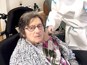 Audrey Clare, 87, receives her first dose of COVID-19 vaccine at Fairfield Park long-term care home in Wallaceburg, on Saturday, Feb. 13. Handout