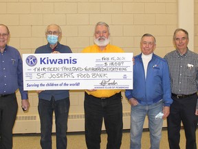 The Kiwanis Club of Pembroke recently made a donation of $13,089 from the 2020 Kiwanis Toy and Food Drive campaign to the St. Joseph's Food Bank in Pembroke. In the photo from left, Kiwanis Toy and Food Drive campaign co-chairman Jay McLaren, food bank volunteer Richard Schmaltz, Kiwanis President Robert Lauder, campaign co-chairman Mack Thrasher, and Kiwanis treasurer Doug Fee.