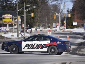 Woodstock police were on scene at Mill Street between Dundas and Simcoe Streets Thursday morning. (Kathleen Saylors/Woodstock Sentinel-Review)