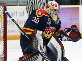 Ethan Morrow (30) of the Wellington Dukes follows the puck during first-period OJHL action at Duncan McDonald Memorial Gardens in Trenton, Ontario on November 17, 2020.