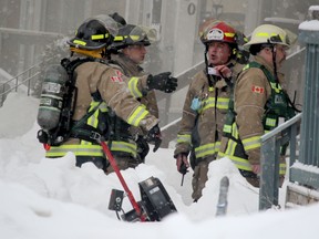 Firefighters respond to a house fire on Grace Street in Sault Ste. Marie, Ont., on Thursday, Feb. 25, 2021. (BRIAN KELLY/THE SAULT STAR/POSTMEDIA NETWORK)