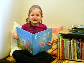 Four-year-old Izzy Martchenko has read nearly 400 books since the end of January to raise money for the Multiple Sclerosis Society of Canada as part of this year's MS Read-a-thon. Izzy's goal is to read 1,000 books by the end of the fundraiser on March 20, all in support of her mom, Lindsey Martchenko, who is both an MS patient and a local ambassador for the MS Society of Canada. Galen Simmons/The Beacon Herald/Postmedia Network