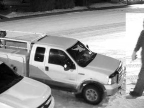 The vehicle is described as a white 2006 Ford F350 with Alberta licence plate CHM5956.