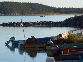 Fishing boats in Lake Athabasca on the shores of Fort Chipewyan, Alta. on September 11, 2013.  Established in 1788, Fort Chipewyan is the oldest settlement in Alberta.  Ryan Jackson/Postmedia Network