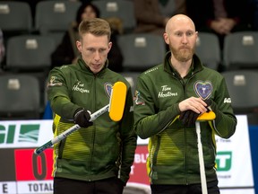 Courtesy Curling Canada 

Northern Ontario third Marc Kennedy (left) and skip Brad Jacobs discuss strategy at the 2020 Tim Hortons Brier in Kingston