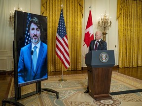 U.S. President Joe Biden and Canadian Prime Minister Justin Trudeau deliver opening statements via video link in the East Room of the White House Feb. 23, 2021.