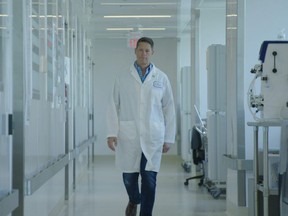 Owen Sound native John Lewis, CEO of Entos Pharmaceuticals, walks to the lab. (Photo credit Kelly Wolfert, Infield Fly Productions)