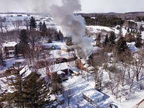 A fire in Paisley, Ont. photographed using a drone on Thursday, Feb. 11, 2021. (James Masters Photography)