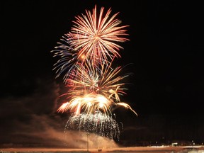 Fireworks burst over the Snye during WinterPLAY on Sunday, February 18, 2018. Vincent McDermott/Fort McMurray Today/Postmedia Network