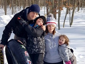 The Lantz family of Markdale have enjoyed flying down their 200-plus foot luge track this winter built in the backyard of their six-acre property. Photo supplied. 

Left to right; Brady Lantz, Carter Lantz (8), Shannon Lantz and Ryleigh Lantz (5).