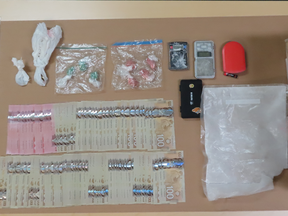 Cash, drugs and other items seized by Wood Buffalo RCMP on Jan. 30, 2021. Supplied Image/Wood Buffalo RCMP
