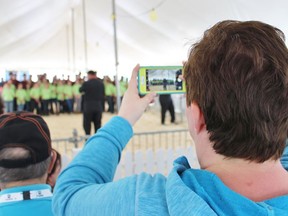 Parents take photos of their children following the live hog show at the Ontario Pork Congress at the Rotary Complex on Thursday June 20, 2019 in Stratford, Ont. (Terry Bridge/Postmedia Network)