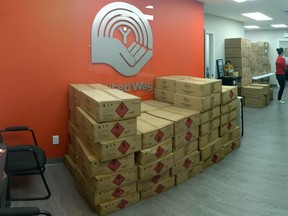 Boxes of donated PPE Equipment await pickup at the United Way of Lethbridge and Southwestern Alberta office.