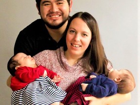 The Ontario Human Rights Tribunal has ruled in favour of former Napanee Beaver newspaper reporter Ashley Espinoza. Pictured with Ashley is her husband, Christofer, and their twin daughters Amelia and Adalyn in 2016. HLR PHOTOGRAPHY