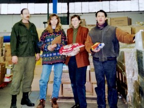 Catherine Hennings provided this photo, clipped from the Lindsay Daily Post in January, 1998, of her ice storm relief effort. She is second from the right, and was not able to identify the other people in the image. (SUBMITTED)