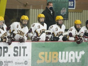 Athens players and coaches watch the action on the ice during an Aeros-Tikis scrimmage at the Brockville Memorial Centre in December. File photo/The Recorder and Times