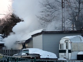 Chatham fire crews were called to a garage fire on Alfred Street in Chatham, Ont., on Feb. 16, 2021. The cause is undetermined and damage is estimated at $50,000. (Ellwood Shreve/Chatham Daily News)