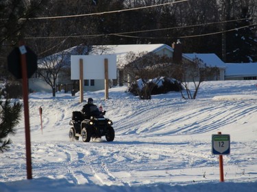 An all-terrain vehicle in the snow near Highway 2 in the Long Sault area. Photo on Sunday, January 31, 2021,  in Long Sault, Ont. Todd Hambleton/Cornwall Standard-Freeholder/Postmedia Network