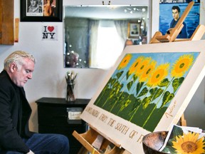 Local artist Kevin MacDonald sits in his home, occupying his free time by finishing paintings. Jordan Haworth/Cornwall Standard-Freeholder/Postmedia Network Supplied