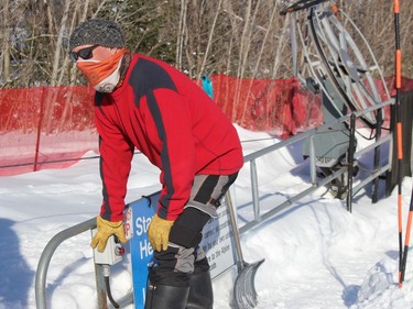 Big Ben volunteer Ron Lauzon at the controls, ensuring safety at the rope tow. Photo on Sunday, February 21, 2021, in Cornwall, Ont. Todd Hambleton/Cornwall Standard-Freeholder/Postmedia Network