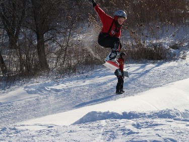 Evan Rutley, 10, had some impressive form when catching some air after going over a jump Sunday afternoon in the terrain park at Big Ben Ski Centre in Cornwall. Photo on Sunday, February 21, 2021, in Cornwall, Ont. Todd Hambleton/Cornwall Standard-Freeholder/Postmedia Network