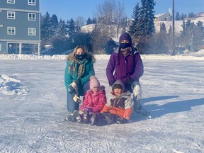 Angela, Lydia, Hendrix and Josée at the new skating rink downtown.