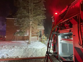 Chatham-Kent firefighters battle a house fire on Sparks Drive in Chatham, Ont., on Saturday, Feb. 20, 2021. (Chatham-Kent Fire & Emergency Services Photo)