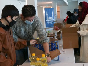 Volunteers with Markaz-Ul-Islam in Fort McMurray pack food hampers on Saturday, February 6, 2021. Sarah Williscraft/Fort McMurray Today/Postmedia Network